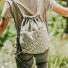 Woman wearing ahana backpack